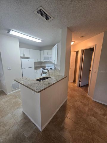 2577 GRASSY POINT DRIVE 105, Lake Mary, FL 32746