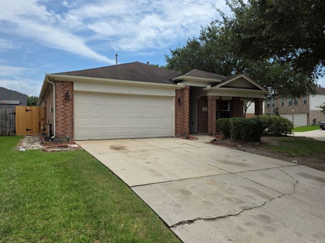 4702 Pin Oak Creek Lane, Kingwood, TX 77345