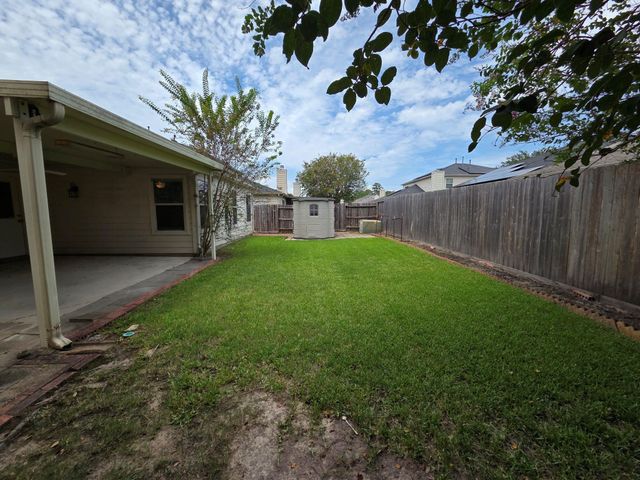 4702 Pin Oak Creek Lane, Kingwood, TX 77345