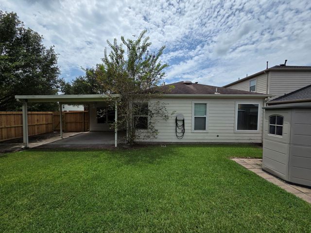4702 Pin Oak Creek Lane, Kingwood, TX 77345