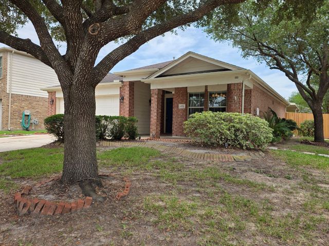 4702 Pin Oak Creek Lane, Kingwood, TX 77345