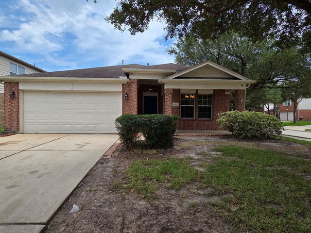 4702 Pin Oak Creek Lane, Kingwood, TX 77345