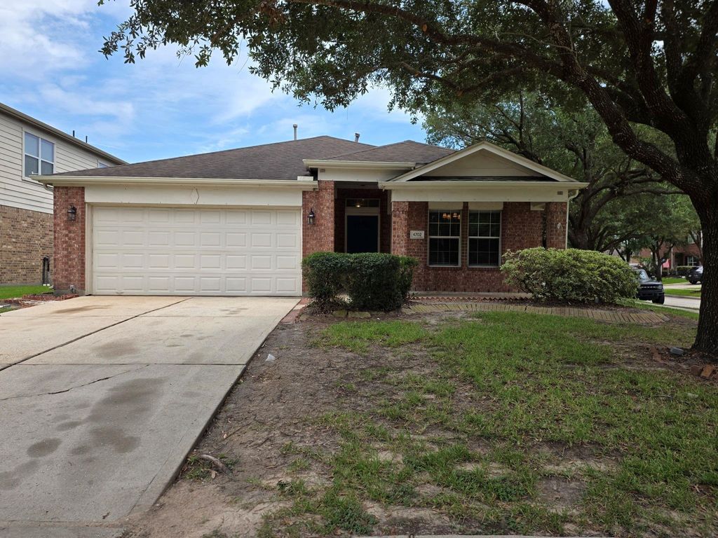 4702 Pin Oak Creek Lane, Kingwood, TX 77345