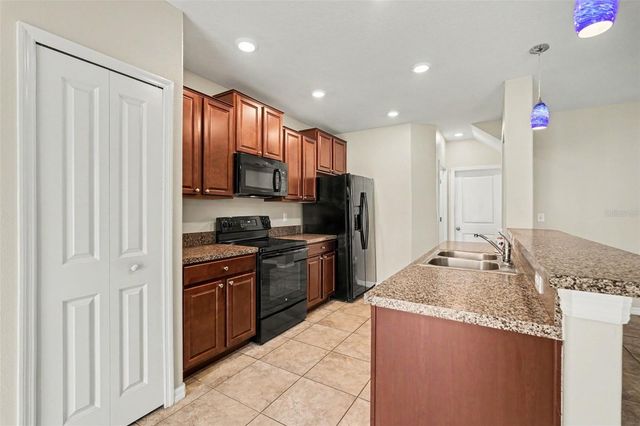 7421 FRENCH MARIGOLD AVENUE, Tampa, FL 33619