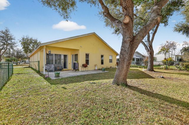 9042 SW Caprice Circle, Stuart, FL 34997