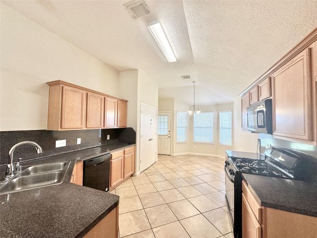 11023 Knobbley Oak Court, Houston, TX 77065