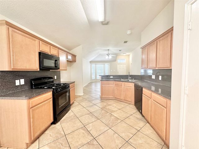 11023 Knobbley Oak Court, Houston, TX 77065