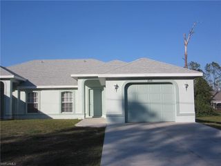 821/823 Meadow RD, Lehigh Acres, FL 33973