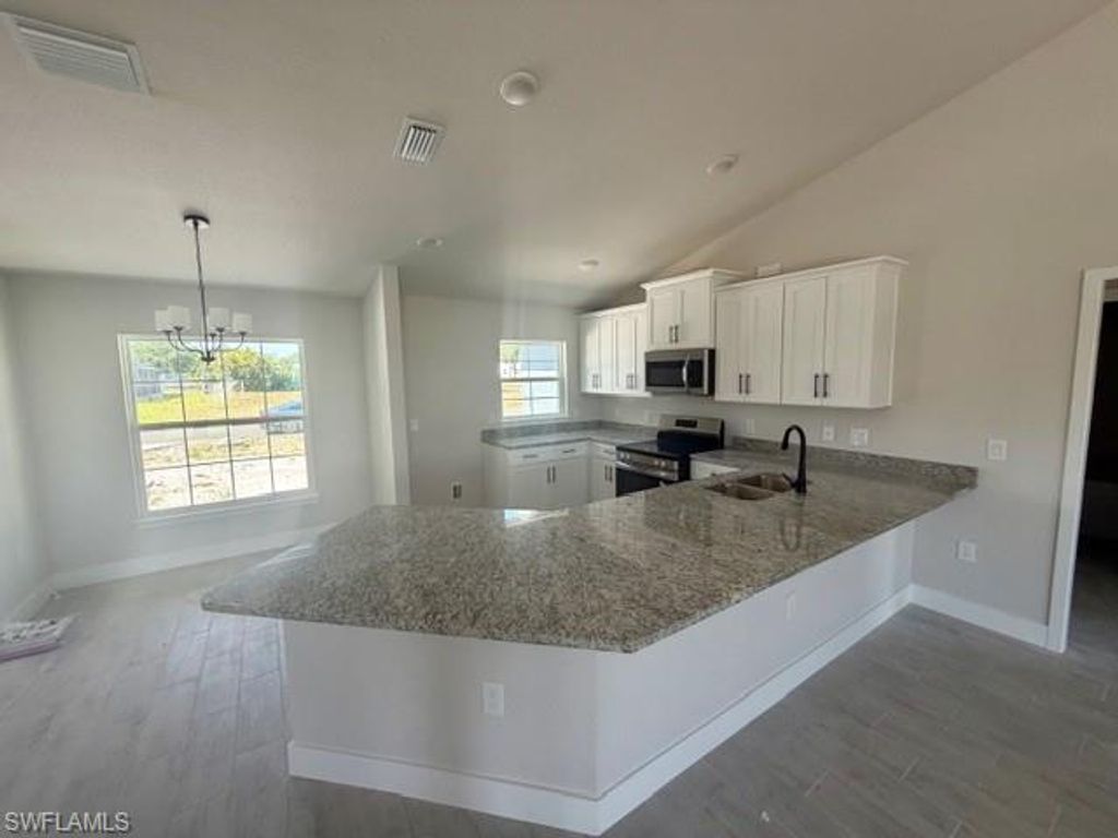 1223 NE 18th TER, CAPE CORAL, FL 33909 — photo 3