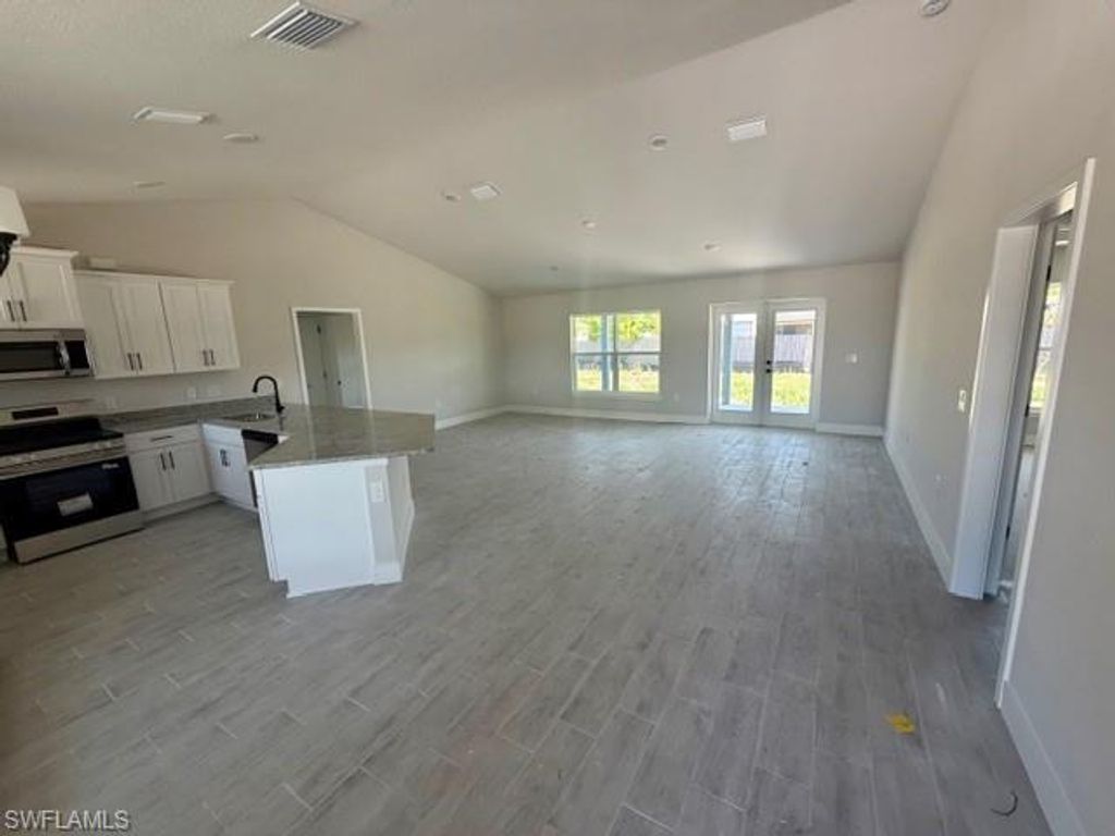 1223 NE 18th TER, CAPE CORAL, FL 33909 — photo 4