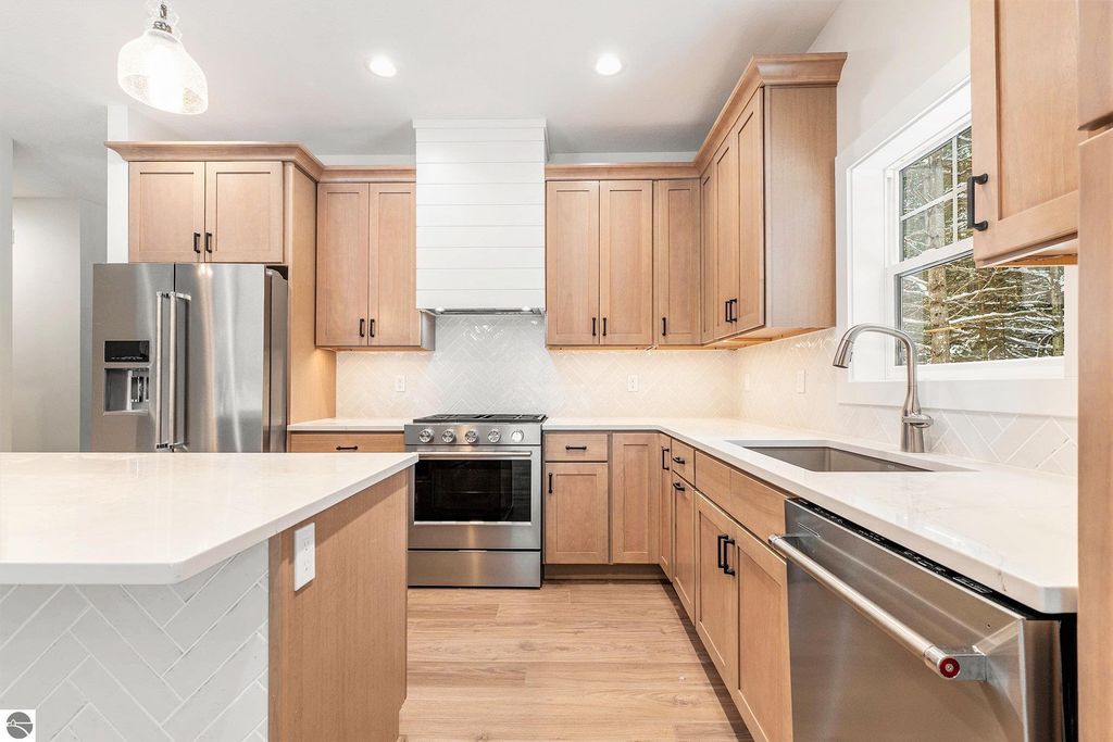 Image 10 of property listing at 6076 Heartwood Trail, Lake Ann, MI 49650