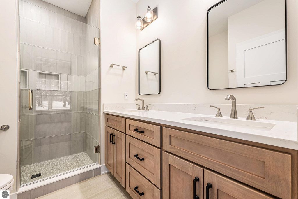 Image 20 of property listing at 6076 Heartwood Trail, Lake Ann, MI 49650