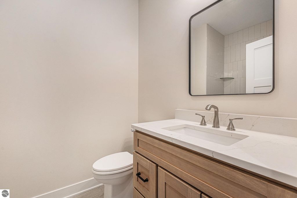 Image 22 of property listing at 6076 Heartwood Trail, Lake Ann, MI 49650