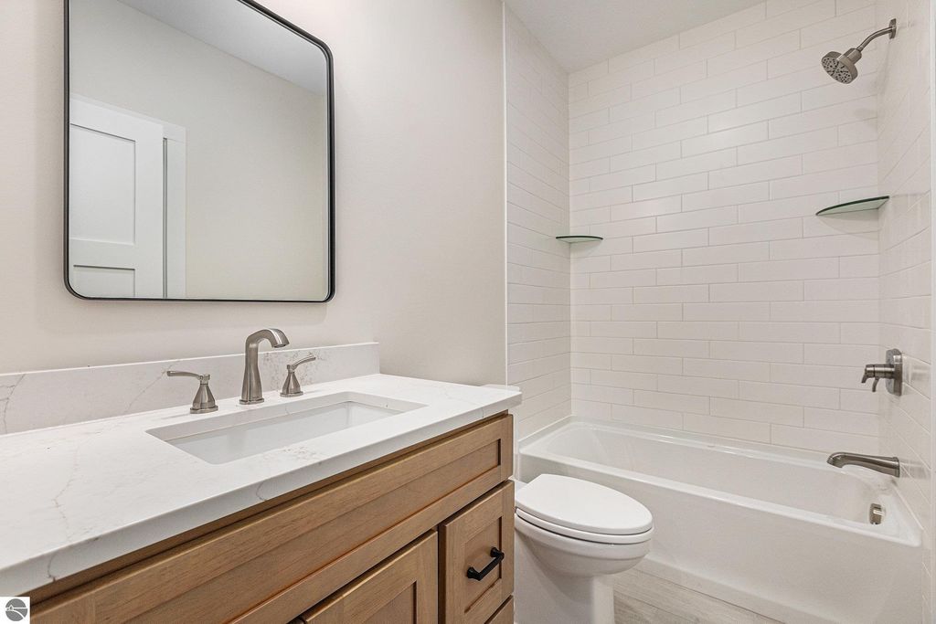 Image 26 of property listing at 6076 Heartwood Trail, Lake Ann, MI 49650