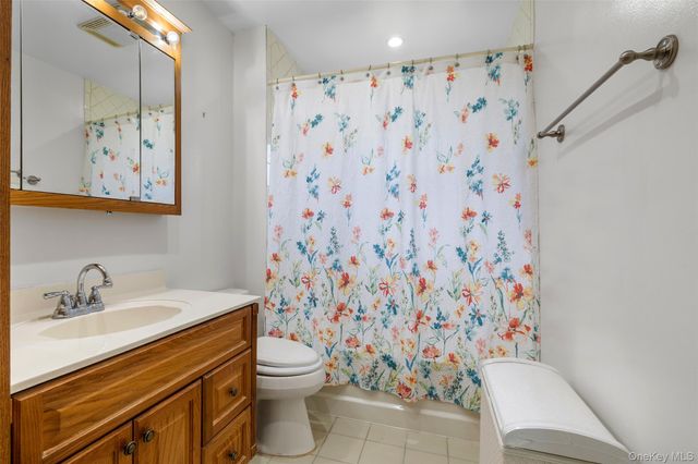 83 Town House Drive, Massapequa Park, NY 11762