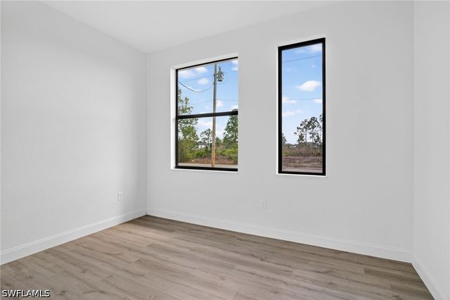 560 Genoa AVE S, Lehigh Acres, FL 33974