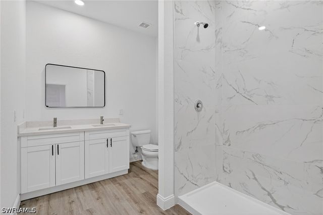 560 Genoa AVE S, Lehigh Acres, FL 33974