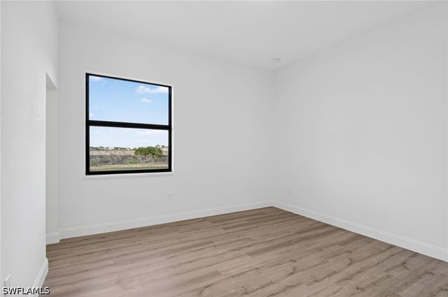 560 Genoa AVE S, Lehigh Acres, FL 33974