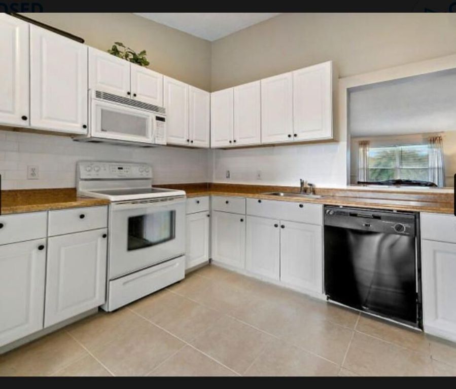 Image 3 of property listing at 13135 Chadwick Court 7, Wellington, FL 33414