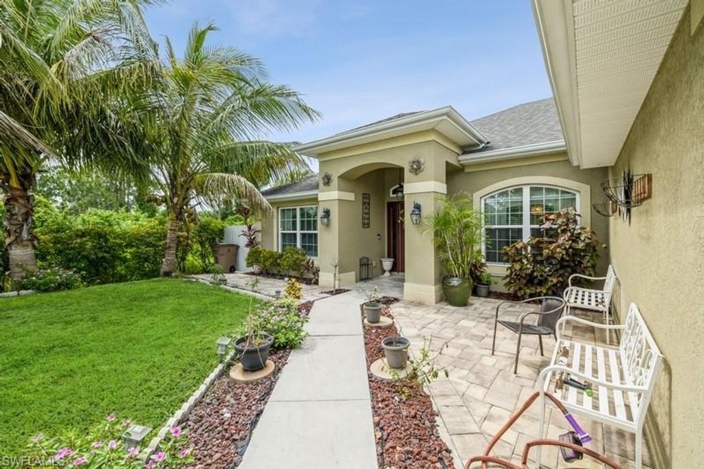 3106 4th ST SW, LEHIGH ACRES, FL 33976 — photo 2