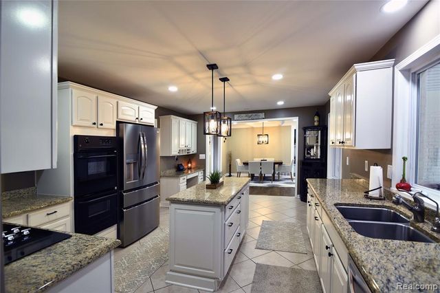 9693 Burning Tree Drive, Grand Blanc, MI 48439