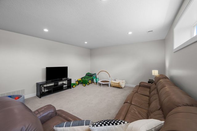 493 MASON Drive, Riverdale, IA 52722