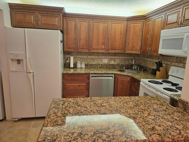 317 Pine Ridge Circle, Greenacres, FL 33463