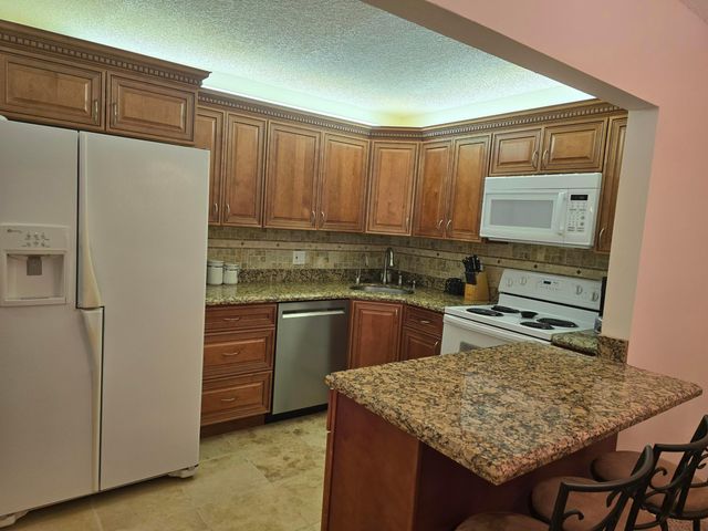 317 Pine Ridge Circle, Greenacres, FL 33463
