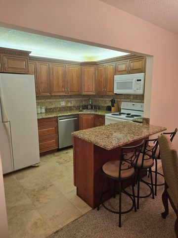 317 Pine Ridge Circle, Greenacres, FL 33463