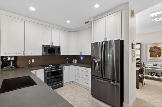 1512 Maple Dr, Weston, FL 33327