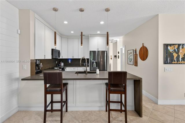 1512 Maple Dr, Weston, FL 33327