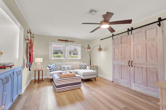 225 Orange Tree Drive, Atlantis, FL 33462