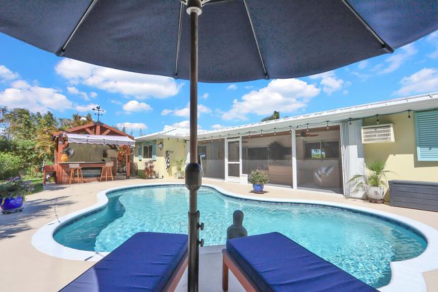 225 Orange Tree Drive, Atlantis, FL 33462