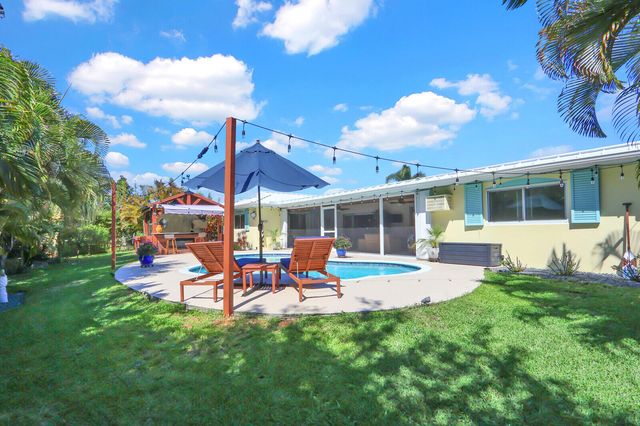 225 Orange Tree Drive, Atlantis, FL 33462