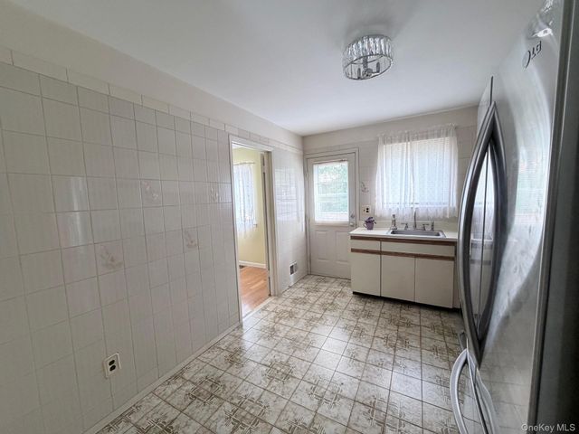 40 Town House Drive, Massapequa Park, NY 11762