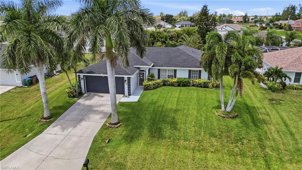 1718 NE 3rd AVE, CAPE CORAL, FL 33909 — exterior