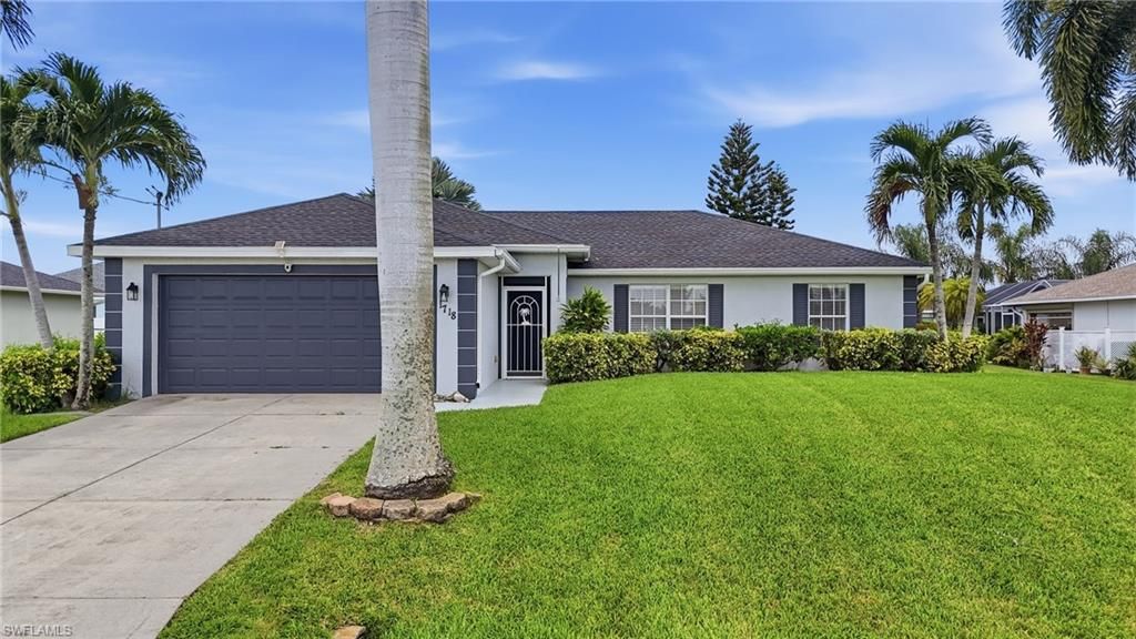 1718 NE 3rd AVE, CAPE CORAL, FL 33909 — photo 2