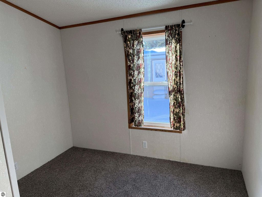 Image 8 of property listing at 6685 M-66 North # 51, Charlevoix, MI 49720