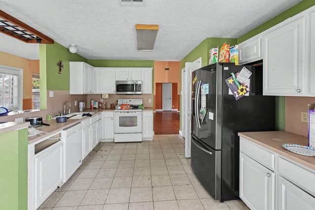 13415 Lake Breeze Lane, Willis, TX 77318