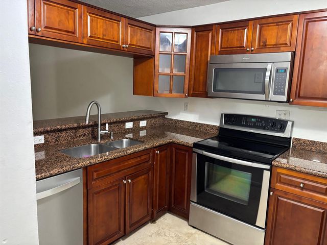 9959 Nob Hill Place, Sunrise, FL 33351