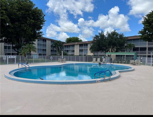400 VILLAGE GREEN Circle W 205, Palm Springs, FL 33461