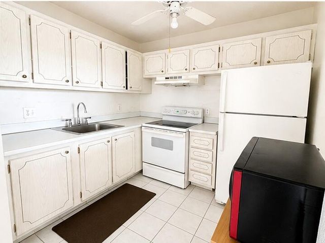 400 VILLAGE GREEN Circle W 205, Palm Springs, FL 33461