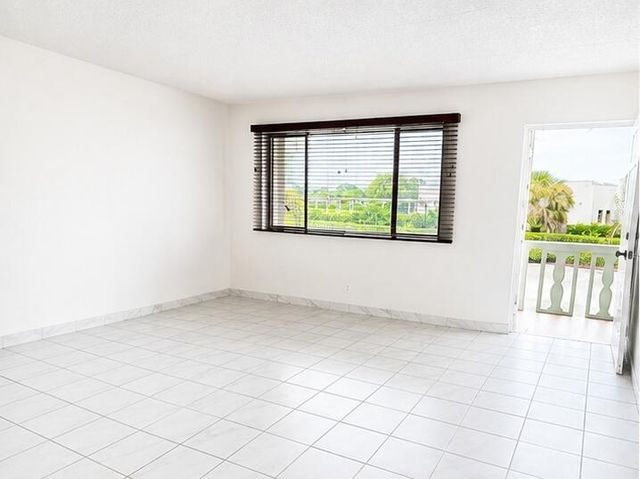 400 VILLAGE GREEN Circle W 205, Palm Springs, FL 33461