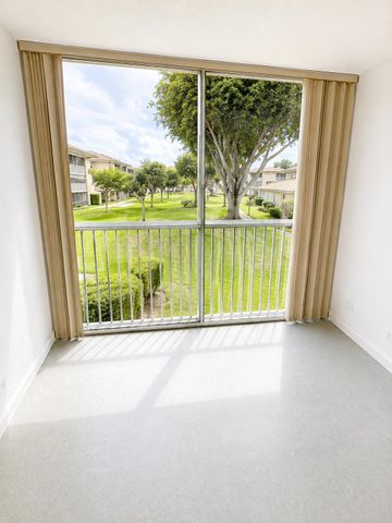 400 VILLAGE GREEN Circle W 205, Palm Springs, FL 33461