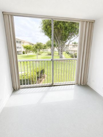 400 VILLAGE GREEN Circle W 205, Palm Springs, FL 33461