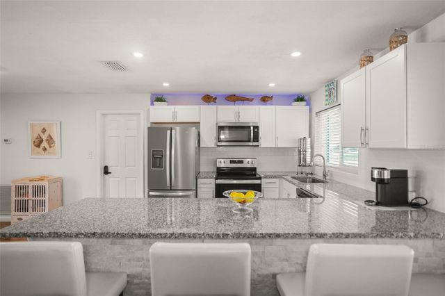 1218 LAZY LAKE ROAD E, Dunedin, FL 34698