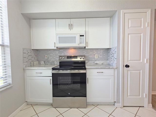 9018 LAKE CHASE ISLAND WAY 9018, Tampa, FL 33626