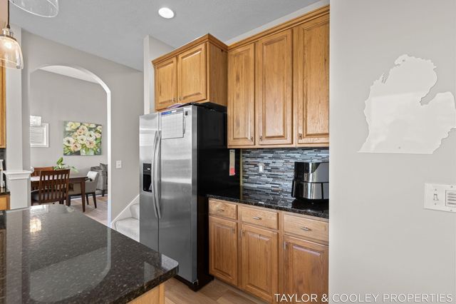 5616 Highbury Drive SE, Ada, MI 49301
