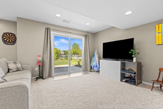 5616 Highbury Drive SE, Ada, MI 49301