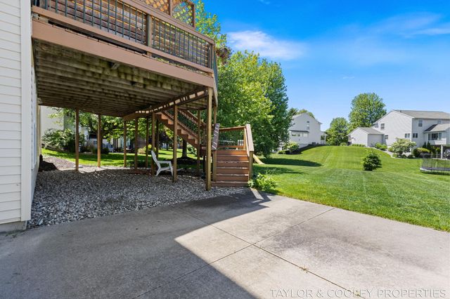 5616 Highbury Drive SE, Ada, MI 49301